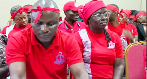 Photo of some teachers dressed in red attires