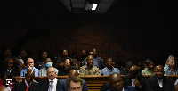Some of the 12 senior police officers who appeared at the magistrate court in Pretoria, South Africa