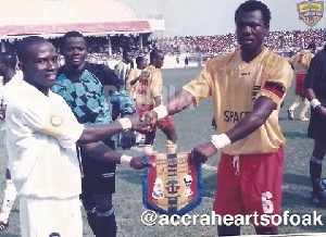 Hearts and Kotoko captains pose for the cameras during the 2004 Confed Cup final