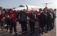 Uganda players arrive at the Tamale Airport.