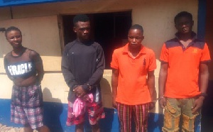 From right Kwame Adoboye, David Akusina (receiver), Abu Mohammed and Alima Mumuni in police grip