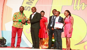 Mr Tudor Sickanartey receiving the award