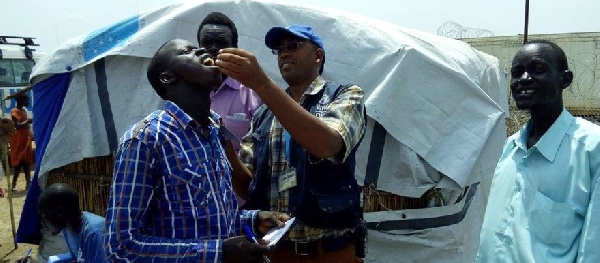 A man receiving a Cholera vaccination