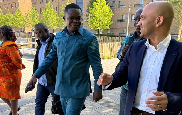 Registrar of the Scholarship Secretariat, Alex Kwaku Asafo Adjei (Middle) during the visit