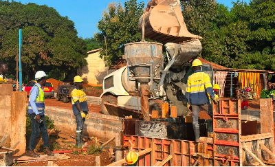 Workers seen working on a section of the road