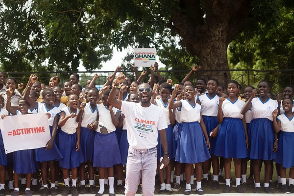 Okyeame Kwame led a group of students to advocate on climate change