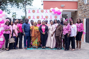 A section of Trust Hospital Management team with Guest of Honour, Partners and pink October team