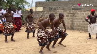 Some energetic men dancing 'agbadza'