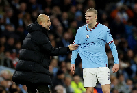 Spanish manager Pep Guardiola and striker Erling Haaland