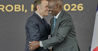 President Emmanuel Macron (L) and Kenya's President William Ruto greet each other at State House