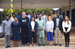 A group picture of participants and guest speakers at the event