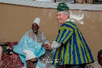 Elder S. Gifford Nielsen shakes hands with Yaa Naa Abubakari Mahama II