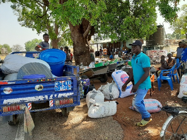 Some residents of Kandiga seated at the Customs checkpoint