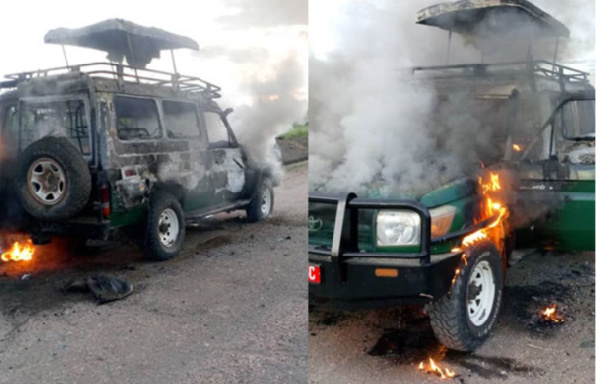 A combination of handout photos showing a burning tour vehicle in which the victims were travelling