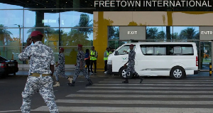 The deportees were escorted from Freetown International Airport in a white van
