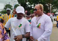 Ayittey Powers (extreme right in the white attire)