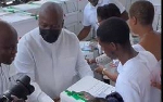 Watch as Mahama distributes food packages to church members at thanksgiving service