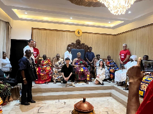 The Ga Mantse with the members of the Onesta Ghana Limited when they visited