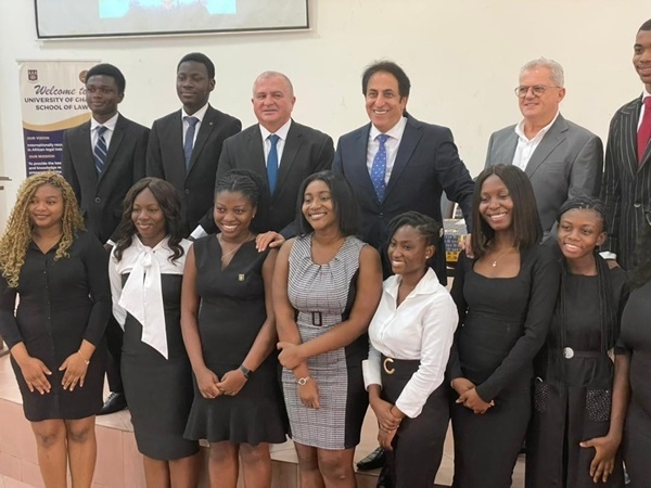 The Lebanese ambassador in a photo with the beneficiaries and reps from the community