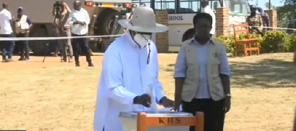 Ugandan President Yoweri Museveni seen casting his vote