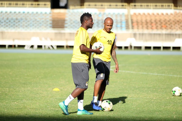 Ghana players Asamoah Gyan and Dede Ayew