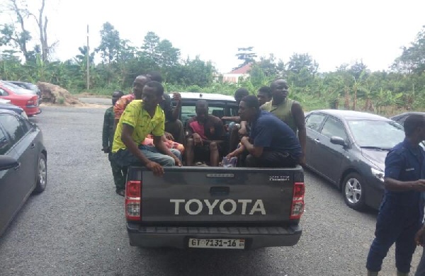 The freed suspects aboard a vehicle at the Court premise