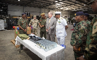 Rear Admiral Godwin Livinus Bessing (in white)
