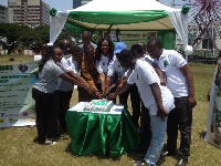 Staff of Conservation Alliance,  with Ama and stakeholders in cake cutting after the launch