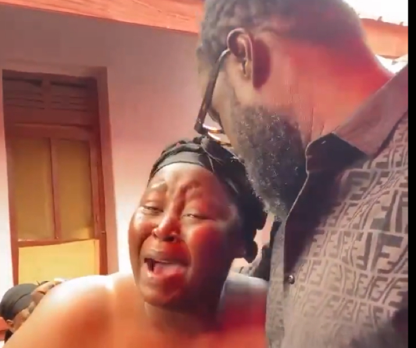 Roman Fada consoling Akua Donkor's daughter