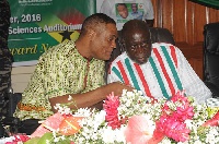 Ivor Greenstreet, flag-bearer of the CPP (left) with a CPP executive
