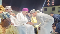 Andre Ayew exchanging pleasantries with some leaders