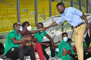 Asante Kotoko coach, Maxwell Konadu and Eleven Wonders coach Ignatius Osei Fosu before the game