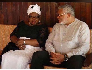 Former President Rawlings with widow of deceased General Acheampong