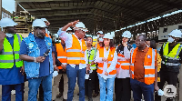 Mahama Ayariga with officials during a tour to key waste management facilities