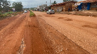 A photo of a deplorable road