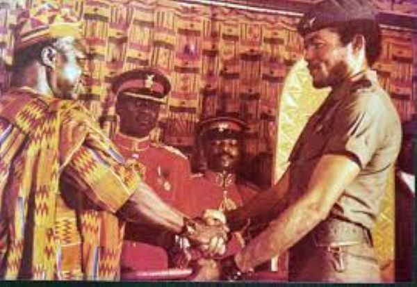 JJ Rawlings (R) handed over power to Dr Limann in a transition ceremony in 1979
