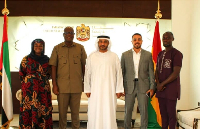 CEO of GIPC Simon Madjie and Dr. Abdulla Almandoos [M] after signing the MoU in Accra