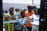 CEO, Atlas Rent-A-Car, Akwasi Marfo cutting the tape to the new corporate office of Rent-A-Car