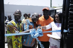 CEO, Atlas Rent-A-Car, Akwasi Marfo cutting the tape to the new corporate office of Rent-A-Car
