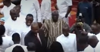 John Dramani Mahama (in black) greeting MPs on the floor of parliament