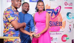 One of the winners taking her award