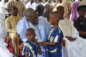 Vice President, Paa Kwasi Bekoe Amissah-Arthur in a hearty chat with some kids at the event.
