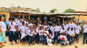 Sonnie Badu with some of the children at the orphanage home