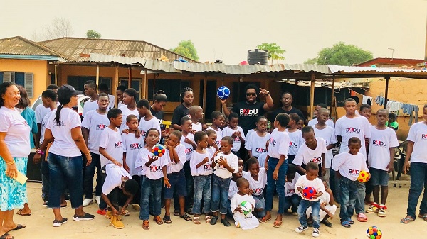 Sonnie Badu with some of the children at the orphanage home