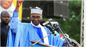 Abdoulaye Wade gestures as he addresses his supporters at a rally in Dakar