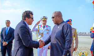 President John Dramani Mahama (R) during his arrival in Egypt