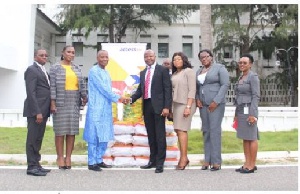 Boniface Abubakar receiving the items from Mr. Ifeanyi Njoku and the Access Bank team
