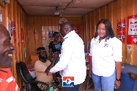 Vice President Dr. Mahamudu Bawumia exchanging pleasantries with a resident of Ada