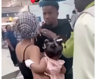 Smashwan in black T-shirt caught in a scuffle with his baby mama at the airport