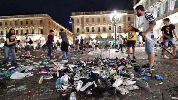 Many fans lost their shoes as they dashed out of the square